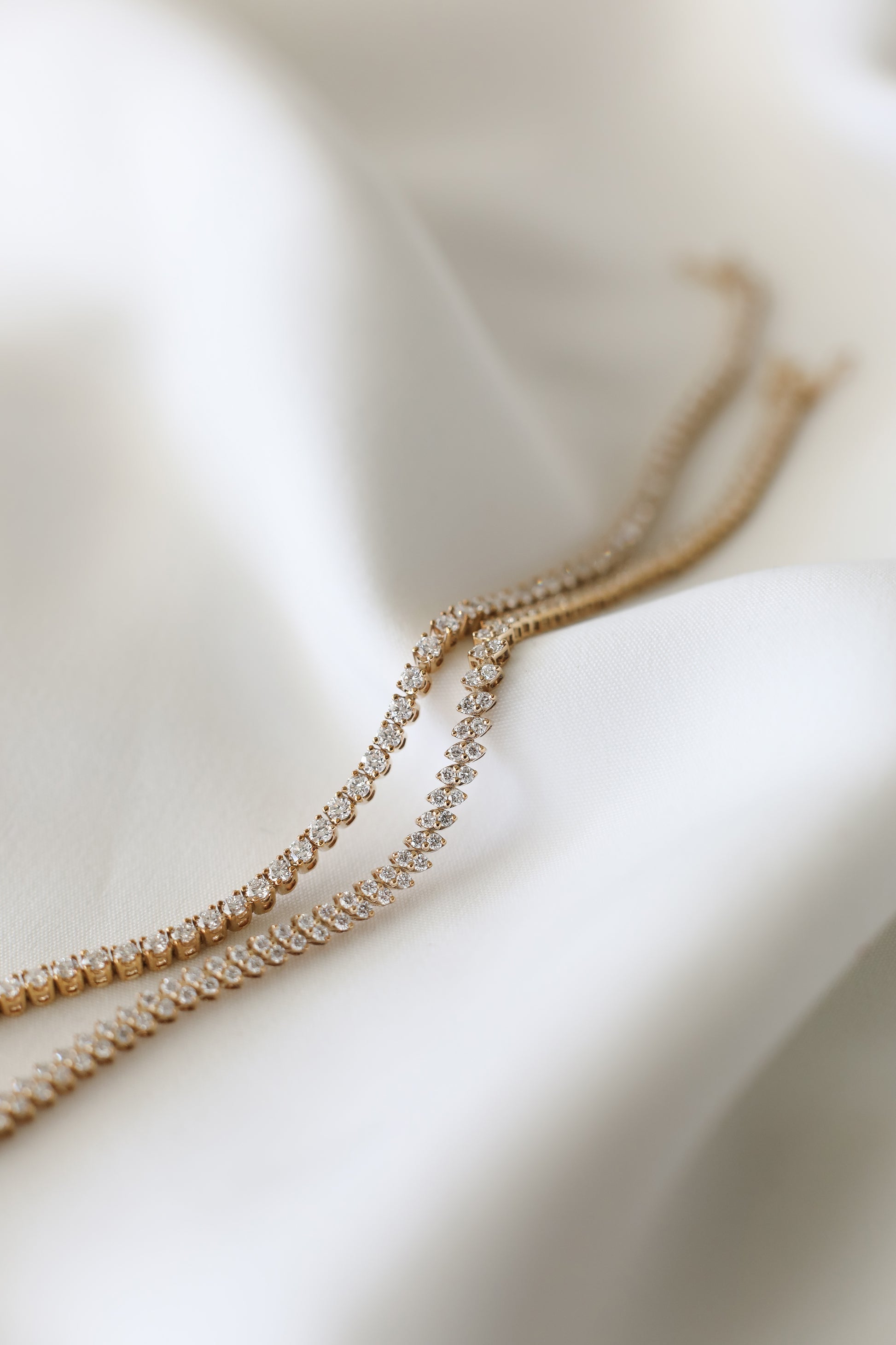Custom jewelry design: tennis bracelets with round and marquise shape lab diamonds